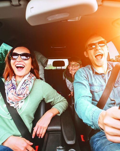 Singing family in car